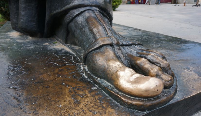 Rubbing the toe of Grgur Ninski for luck: Do you know you can do this in 3 places in Croatia?