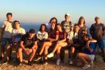 American-Croatian helping locals improve English writing skills on an outdoor adventure