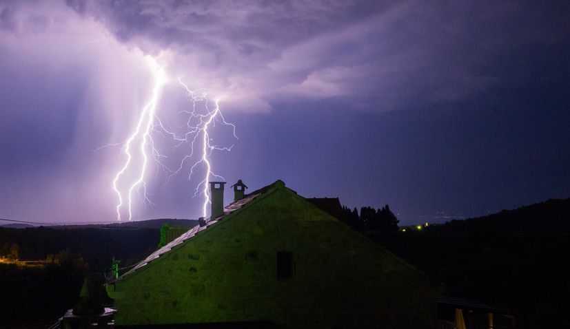 Lightning damages church bell tower on island of Brač, debris hits cars and roofs