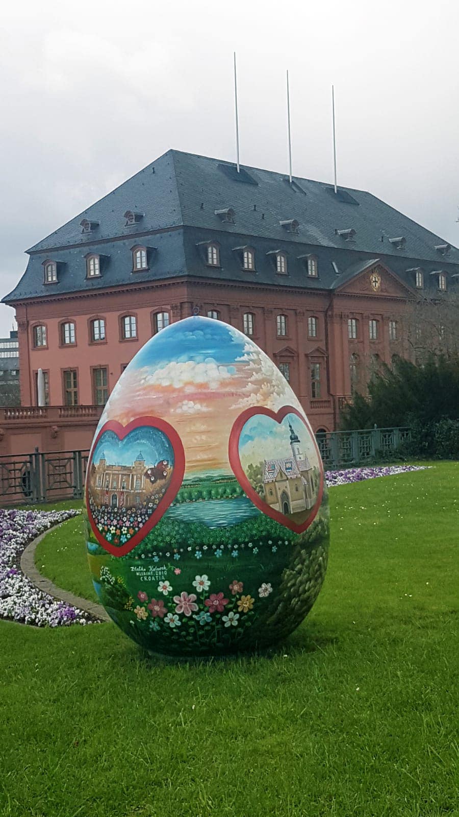 Giant Easter eggs in distinctive Croatian naive style on display in the center of Mainz